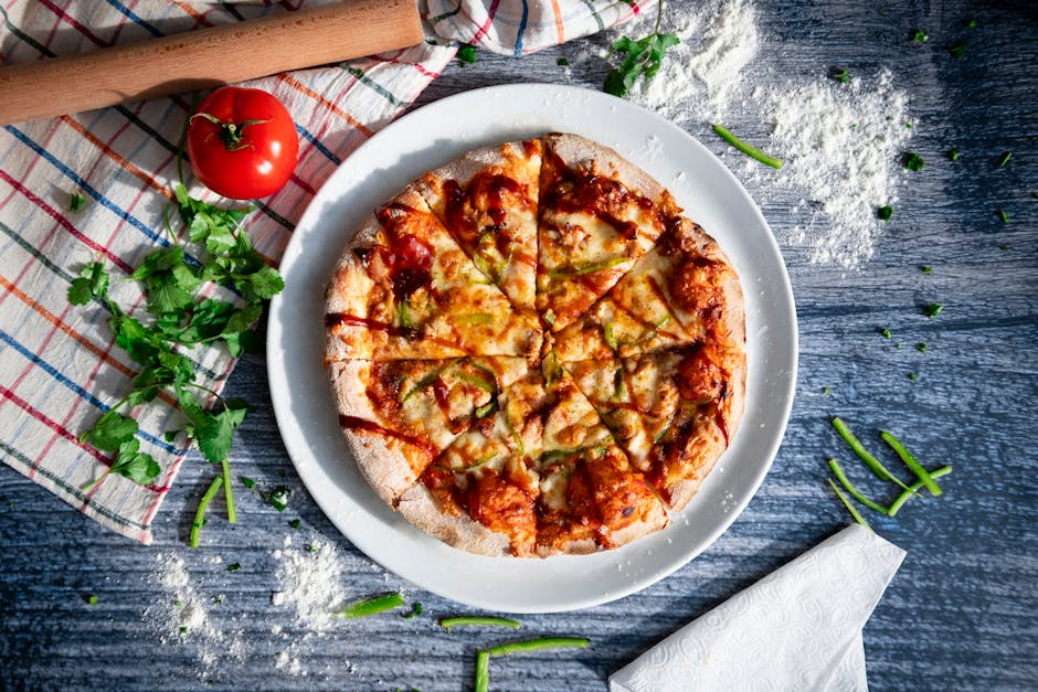 A mouthwatering homemade pizza topped with fresh ingredients on a rustic surface. Perfect for food enthusiasts.